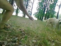 Cute blonde gets naked in a car out in the woods and walks around