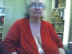 Fat saggy granny strips and masturbates on webcam