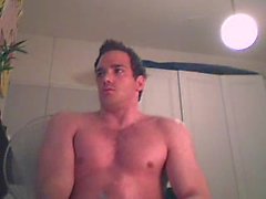 Handsome muscular guy jerking off on cam