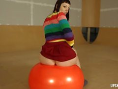Big ass cardigan babe bouncing on an exercise ball
