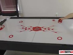 Strip Air Hockey game gets rambunctious