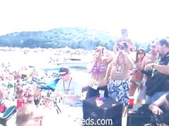 Coeds in naked dancing contest on a lake