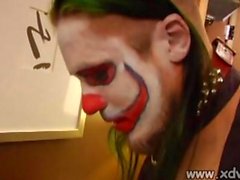 Horny Redheaded Amateur With Pretty Colorful Tattoos Is Getting Fucked By A Clown