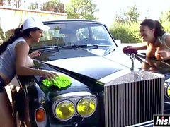 Naughty girls wash an expensive car