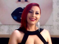 Redhead lady smoking on webcam