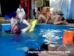 Group sex swinger's pool party with hot sucking and fucking