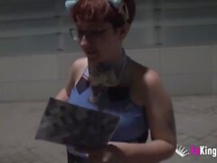 Busty nerd redhead looks for guys to suck in a public street