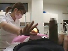 Cute Asian dentist works on a horny patient with a stiff er