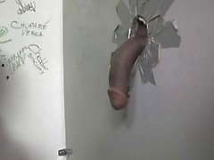 Busty tattooed bruentte sucks glory hole dick in toilet