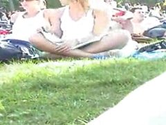 Upskirt girl at the park shows pussy
