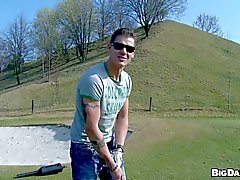 Muscular handsome studs tease each other in the golf course