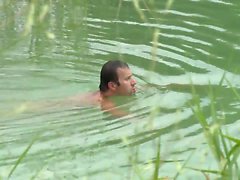 Slender brunette sucks guys tool after a swim in the lake