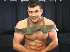 Huge oiled up bodybuilder eats cum