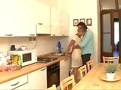 Fucking the old slut on her kitchen table