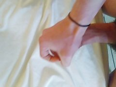 Jacking off and cumming on hotel bed