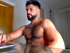 Gay latin stud jerks off his cock until he cums