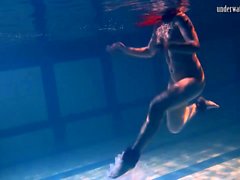 Bulava Lozhkova with a red tie and skirt underwater