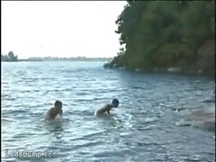 Hot naked bathers banging on the shore of the lake