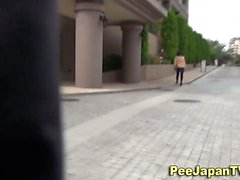 Long legged asian pisses