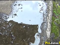 Asian piss in carpark